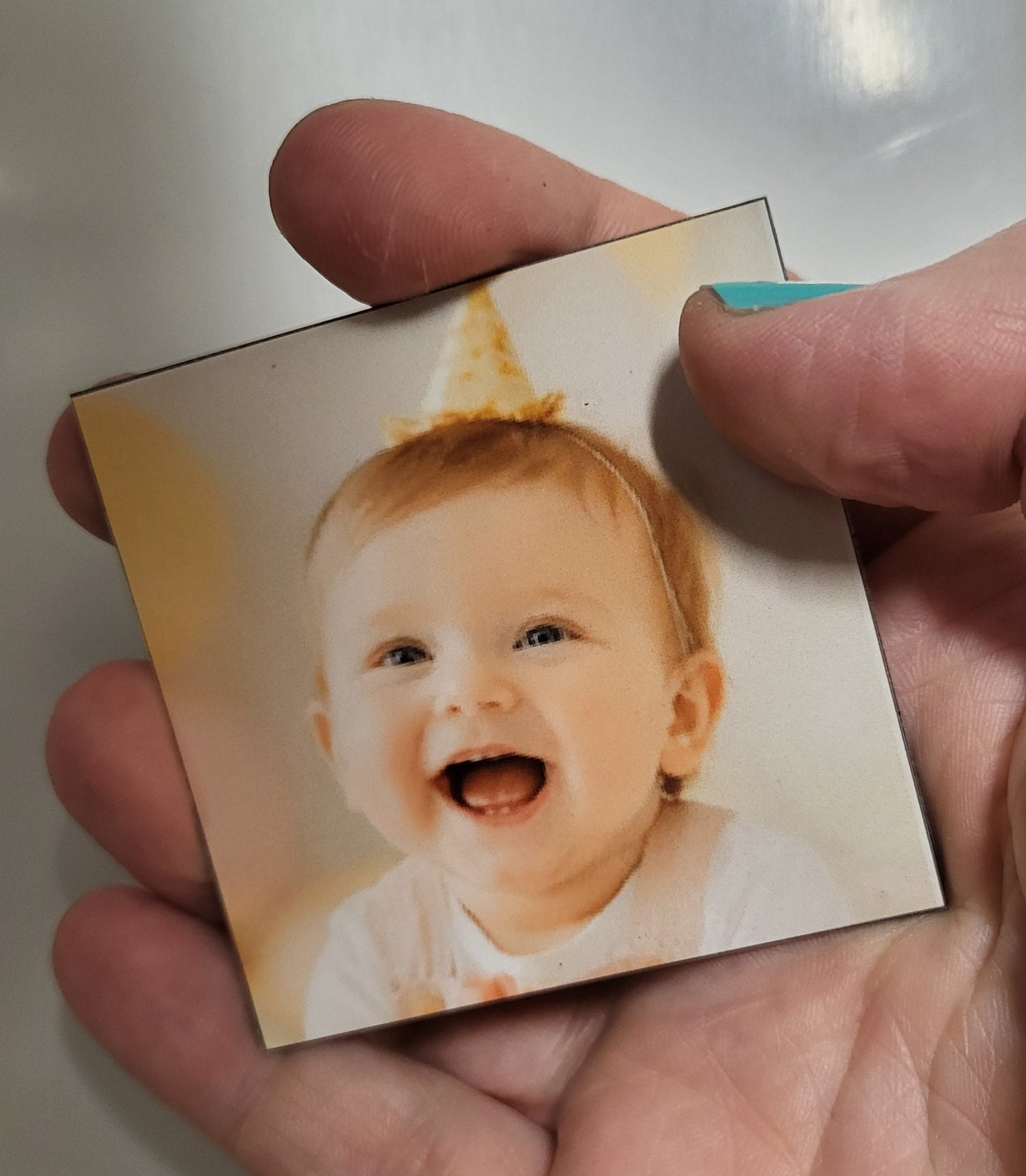 hand holding storyboard magnet on white board